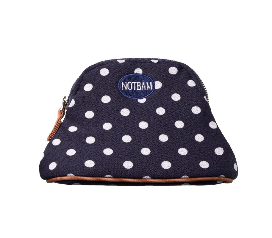 紺色地に白い水玉模様が特徴的な、NOTBAMのロゴが入った小さなポーチです。上部にジッパーがあり、茶色の縁取りが施されています。小物入れとして使用できる可愛らしいデザインです。