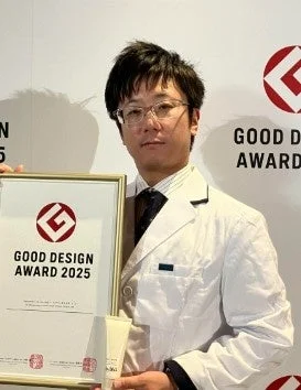 グッドデザイン賞受賞の男性研究員