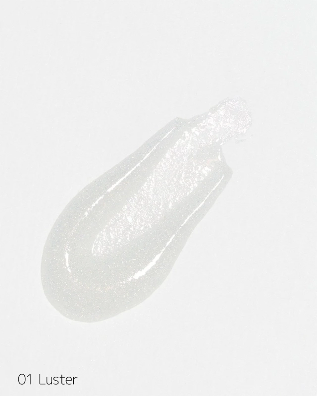 きらめくラメ入りの透明なリップグロス「01 Luster」のスウォッチ